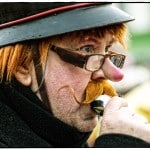 Person in costume with fake glasses and nose.