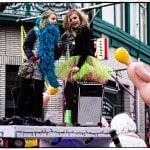 Colorful carnival parade with costumes and inflatables