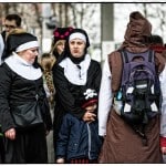 Group in monk and nun costumes at event