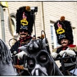 Two guards in ceremonial uniforms on horseback