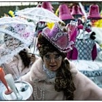Colorful costumes at vibrant street parade celebration.