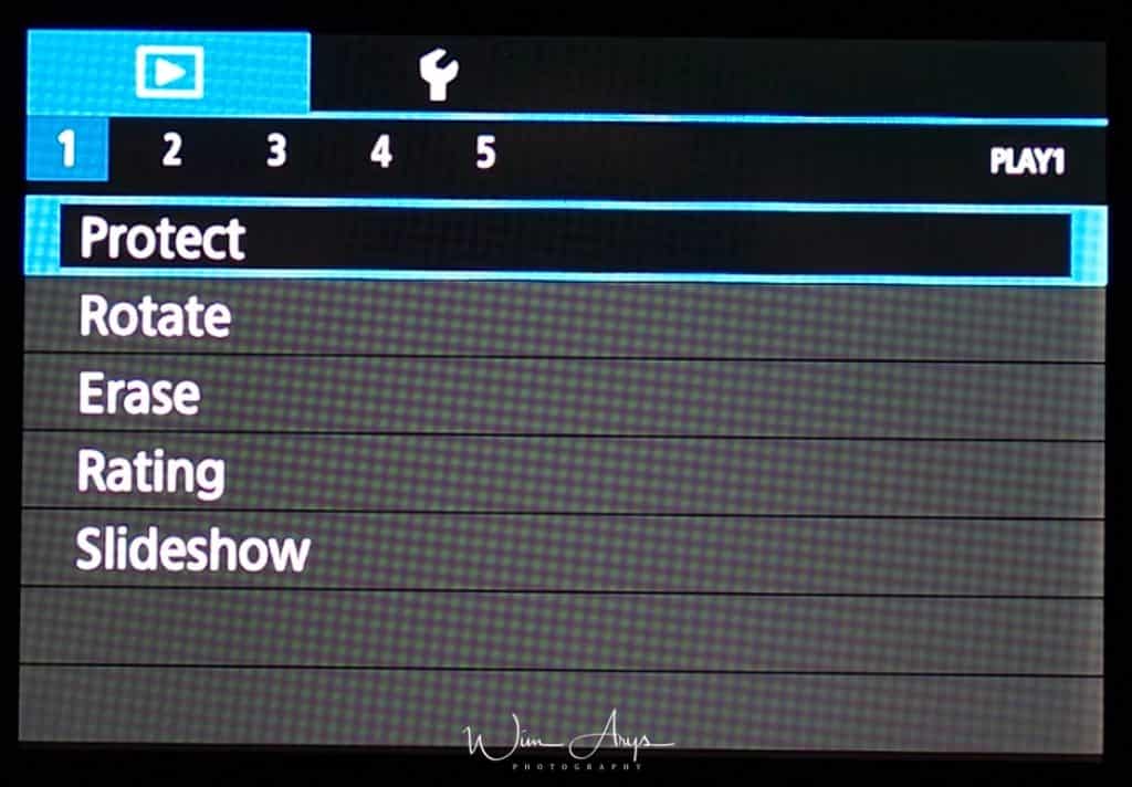 Canon EOS M100 playback menu page 1