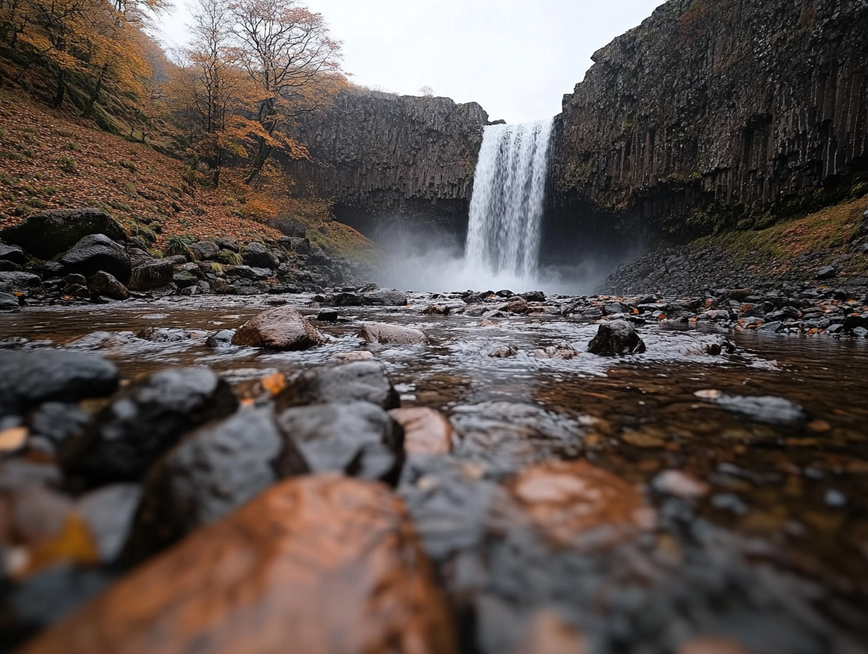 a serene waterfall scene captured with a slow shutter speed